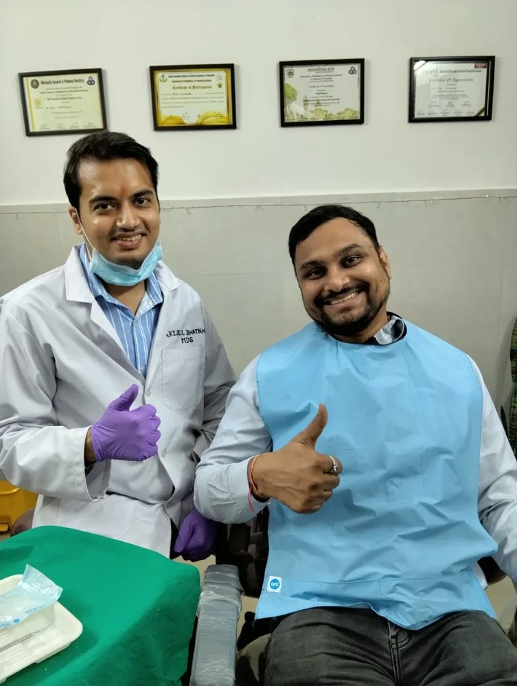 Adult patient after painless root canal with Dr. Rijul